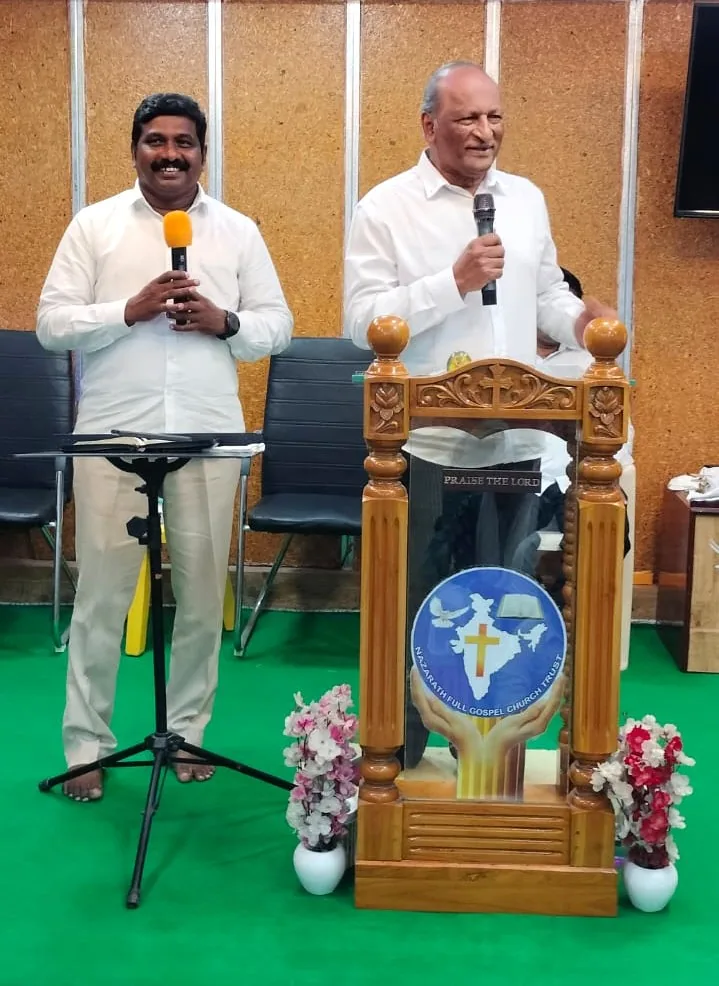 Abel Govender teaching the Word at a church in India