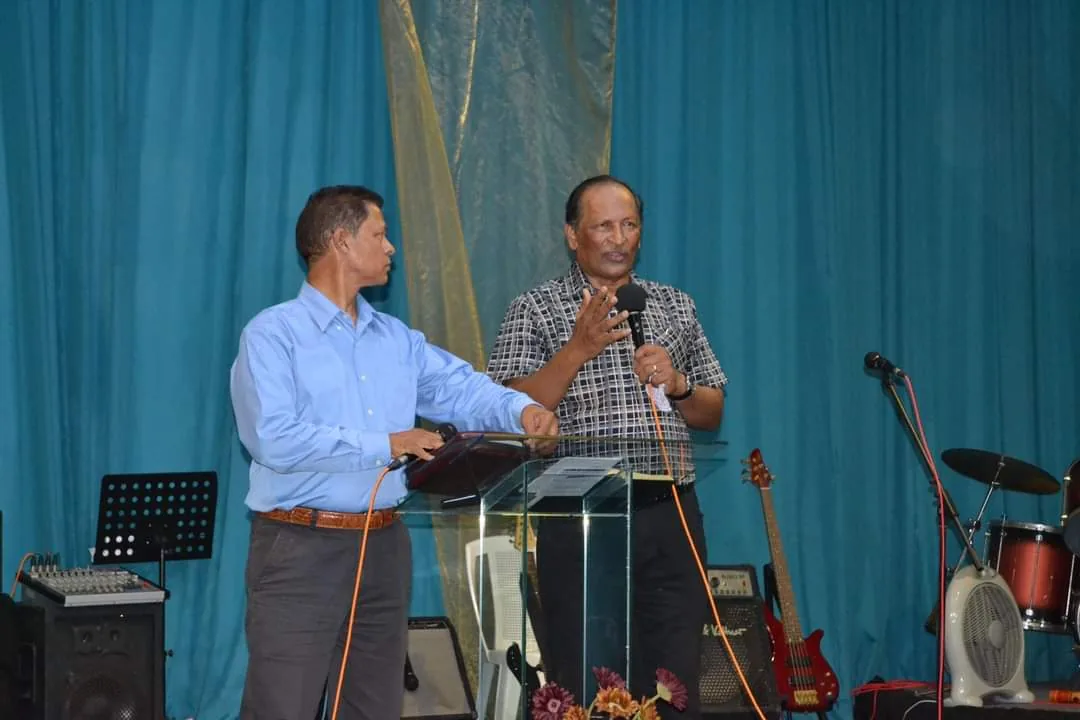 Abel Govender preaching at a church in Mauritius